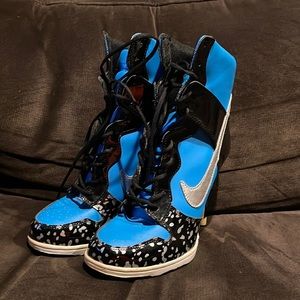 Nike high heeled lace up booties have never been worn.